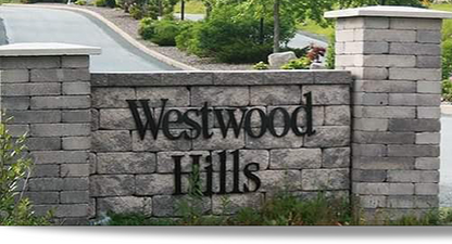 Westwood Hills stone wall decorative ornament with wreaths, Christmas village accessory